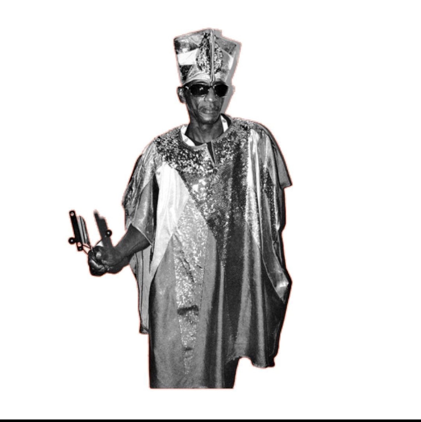 My father in a silver agbada, peace sign