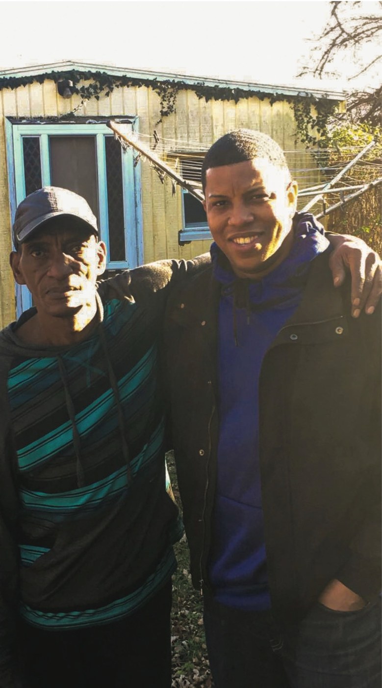 My father and me outside on the block