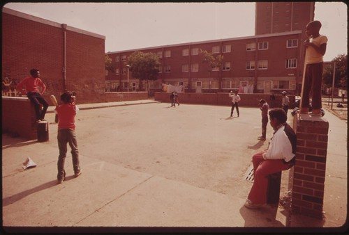 Children playing in a North Philadelphia housing development playground, 1973