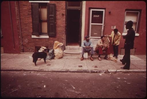 Neighbors gathered on the front stoop of 2205 in North Philadelphia, 1973