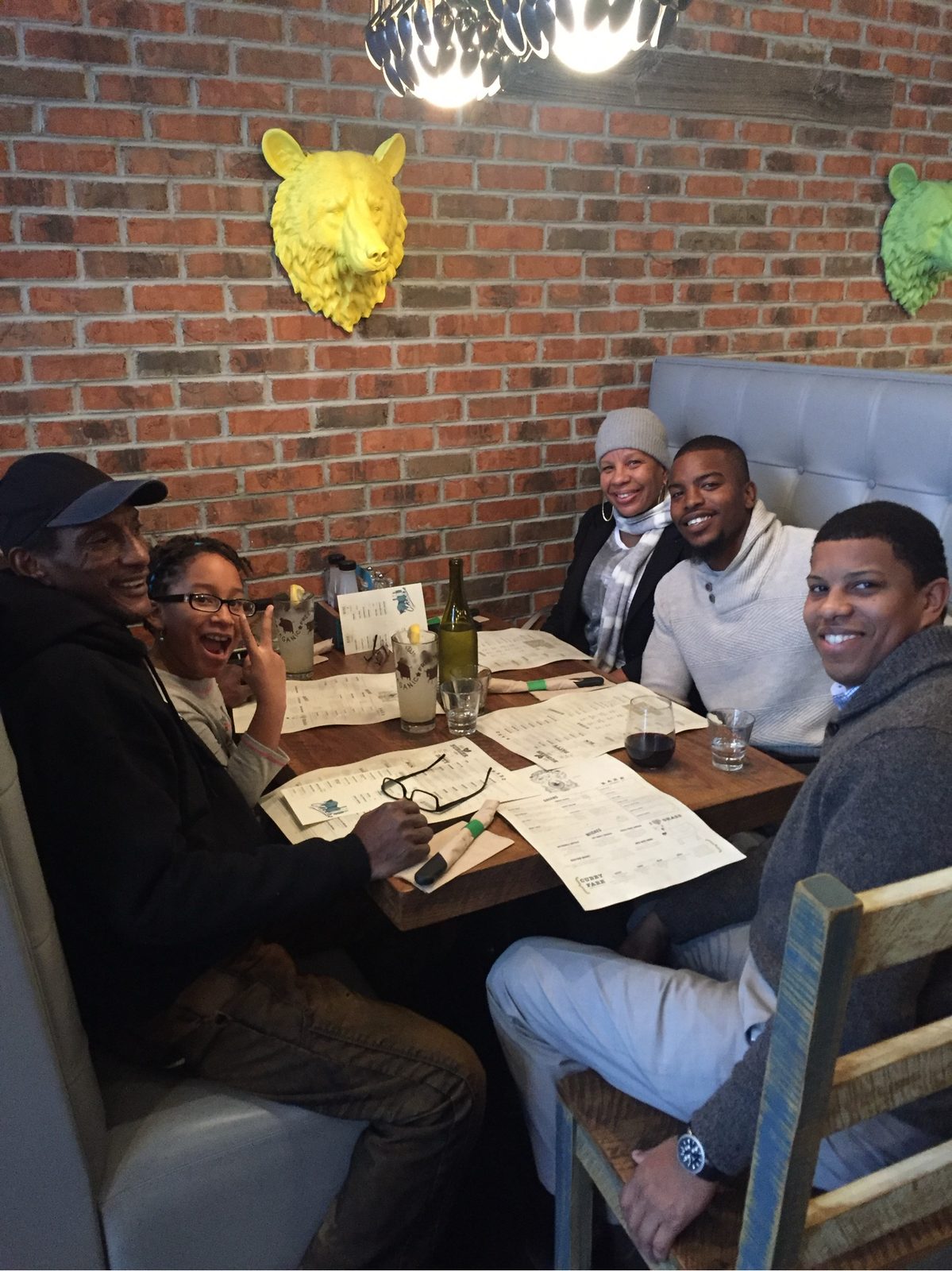 Family gathered at a restaurant table