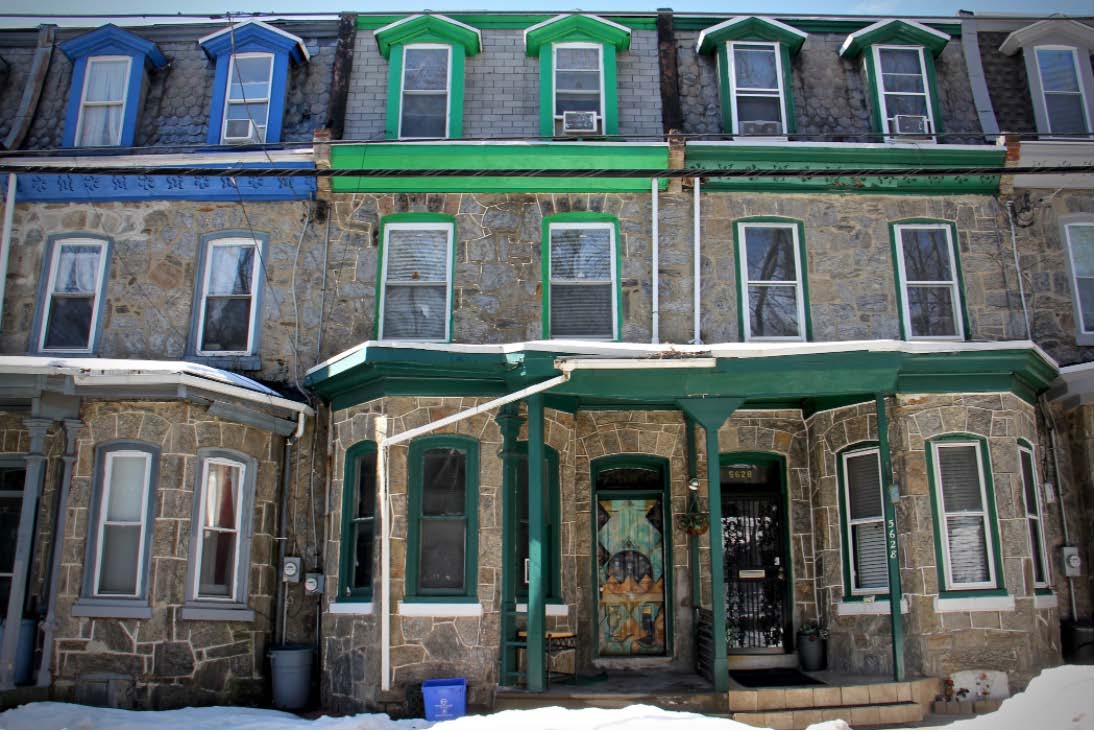 The Sun Ra House with its painted Afrofuturistic front door, Morton Street, Germantown